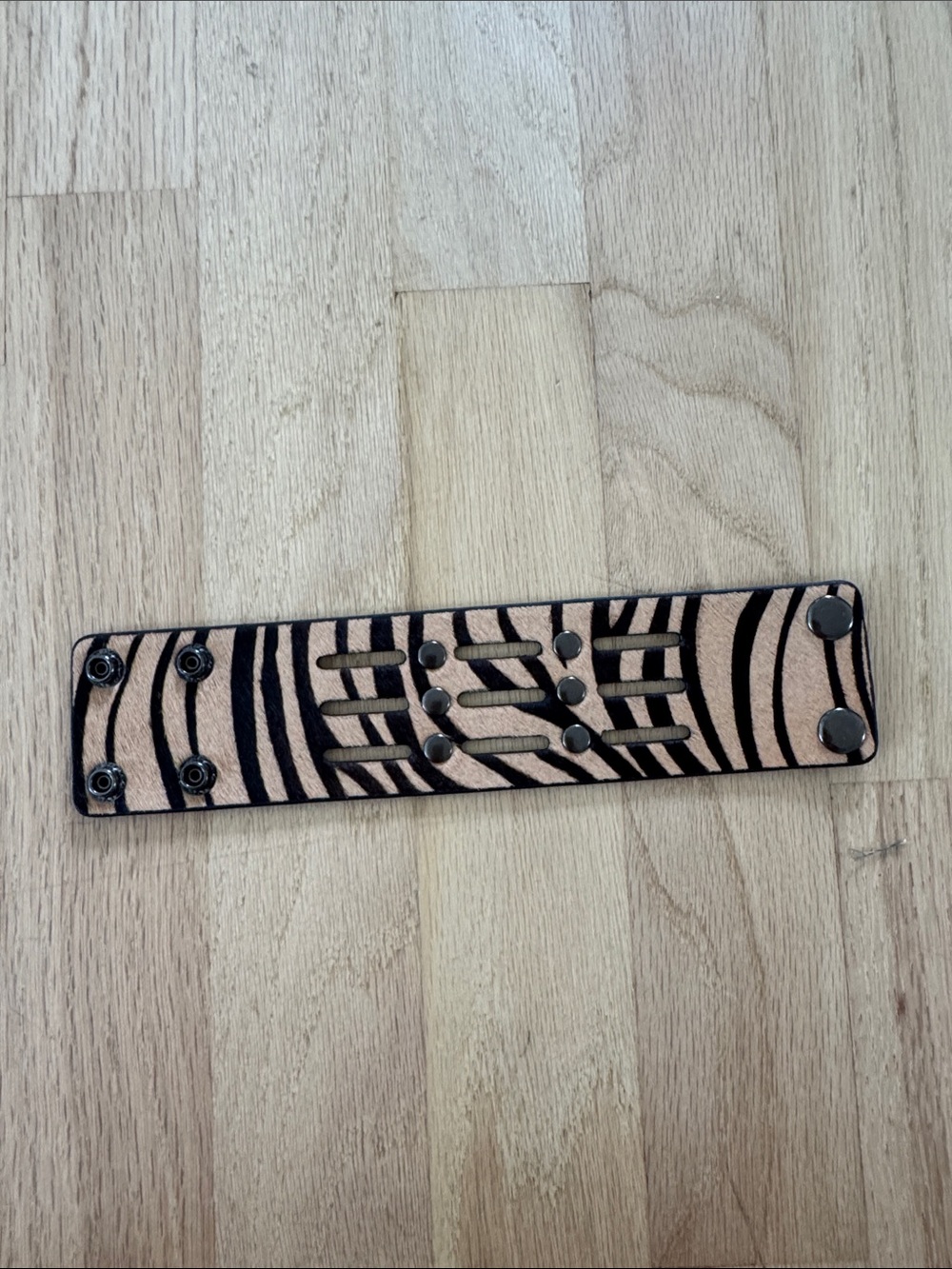 Nanette Lepore Black and Beige Zebra-Print Leather Cutout Cuff Bracelet
